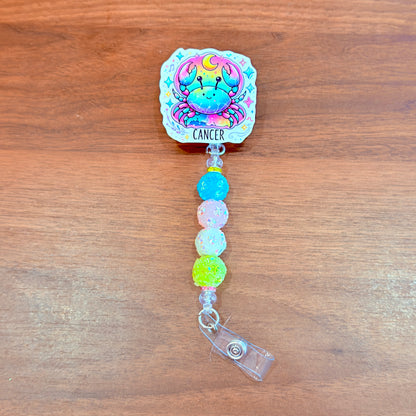 Cancer Zodiac Rhinestone Badge Reel – Acrylic Beaded ID Holder | Swivel Alligator Clip | Retractable Nurse, Teacher & Office Badge Reel