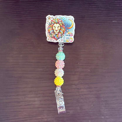 Leo Zodiac Rhinestone Badge Reel – Acrylic Beaded ID Holder | Swivel Alligator Clip | Retractable Nurse, Teacher & Office Badge Reel